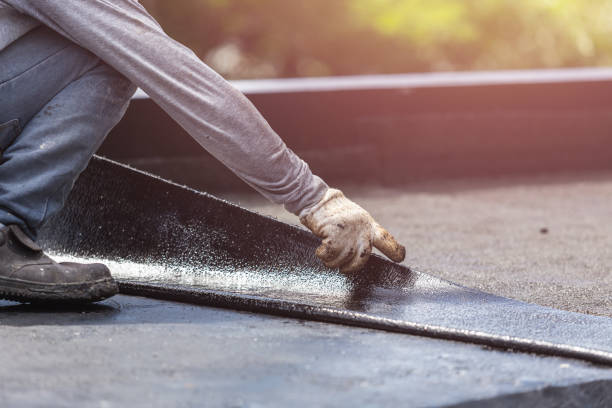 Professional Basement Waterproofing technician working in Smithfield, VA